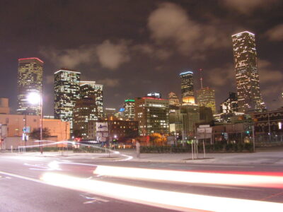 JPMorgan Chase Tower with Houston Skyline at night e1729809532900